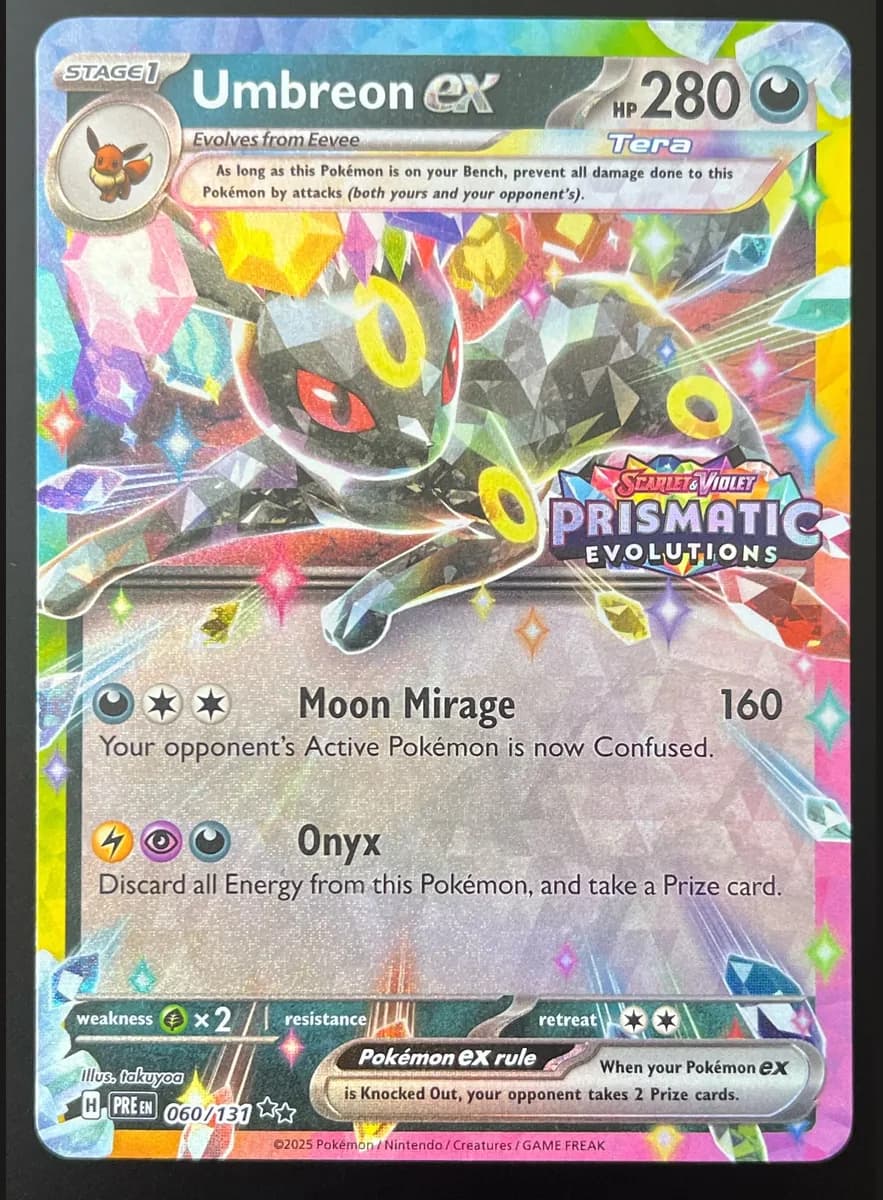Umbreon ex (Tera) photographed on a black background